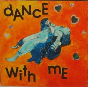 A lady lies back on a man with a wheelchair - hearts are in the picture, and the text read "dance with me"